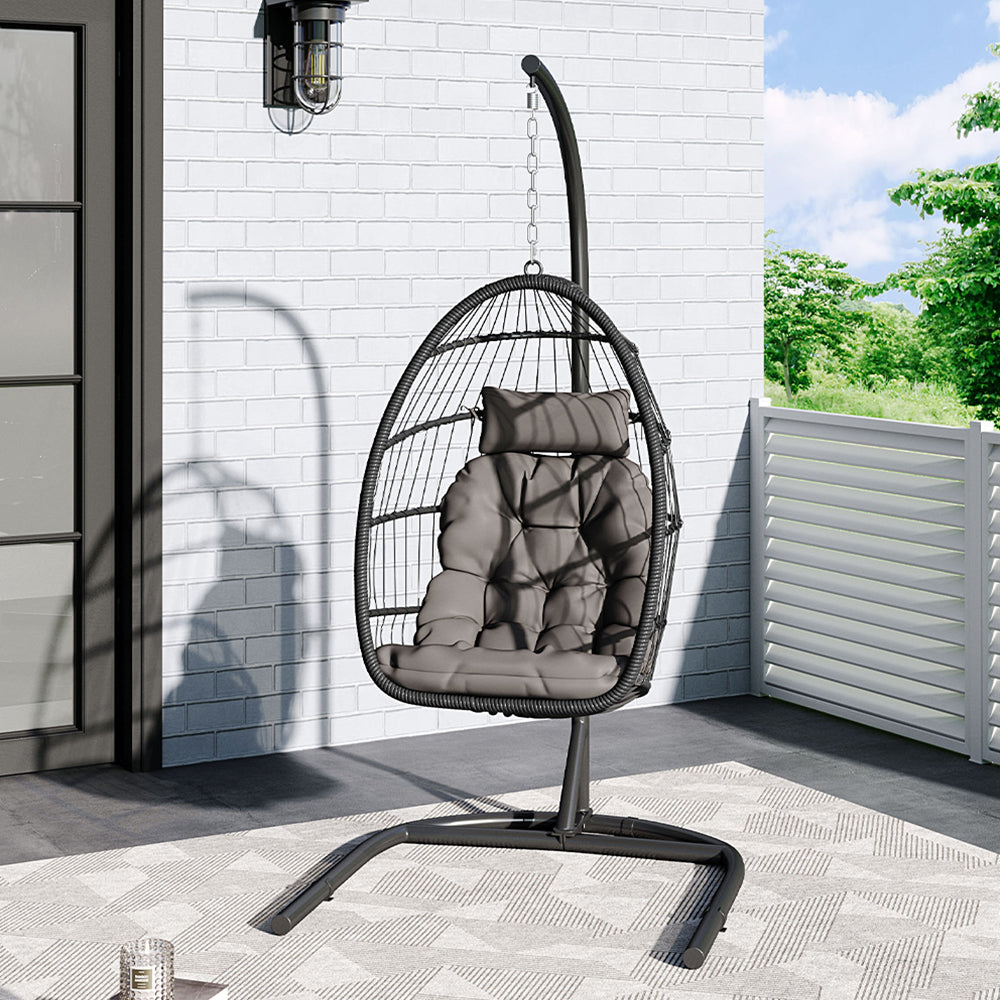 Garden Sanctuary outdoor hanging egg-shaped chair with a cozy cushion, perfect for relaxing in the garden or patio.