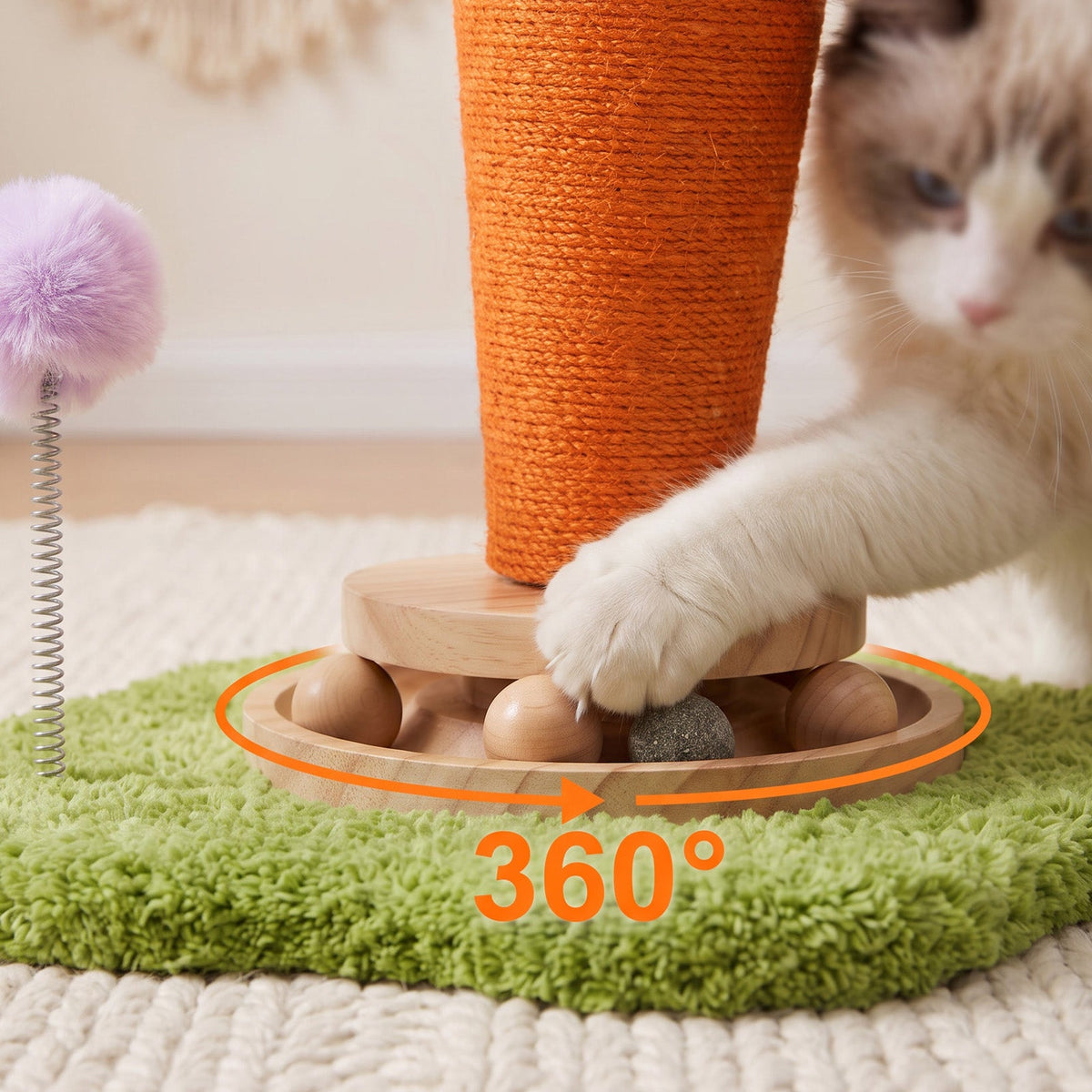 Garden Sanctuary carrot-shaped cat scratching post with turntable toy, designed as a fun, interactive cat litter box accessory.