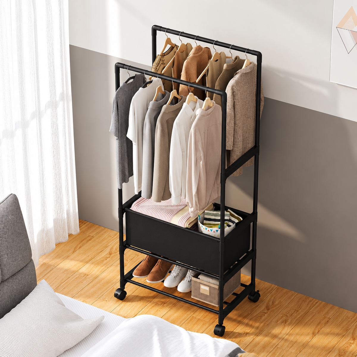 Garden Sanctuary double rod metal clothes rack on wheels with sturdy frame and hanging space for clothing storage.
