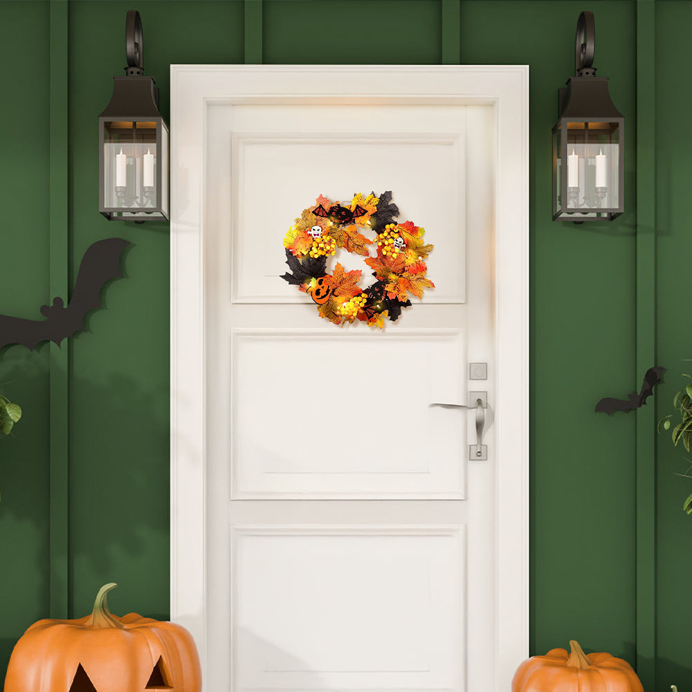 Realistic Halloween decoration wreath with LED lights from Garden Sanctuary, featuring spooky autumn-themed foliage and glowing accents.