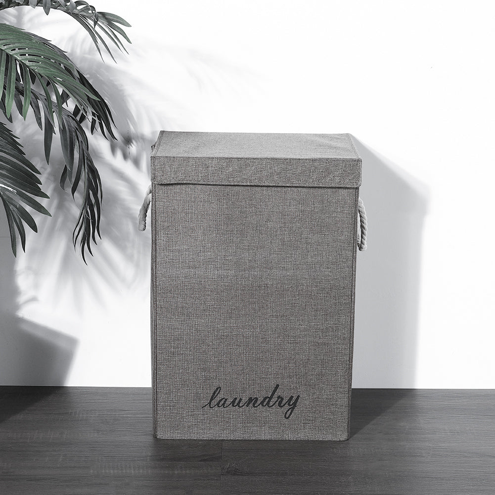 Foldable Garden Sanctuary laundry hamper with handles, lightweight and collapsible for easy home laundry organization.