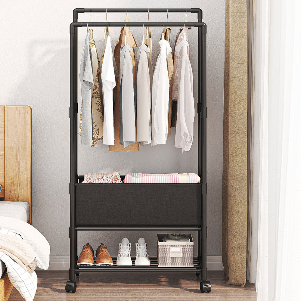Garden Sanctuary double rod metal clothes rack on wheels with sturdy frame and multiple hanging bars for versatile clothing storage.