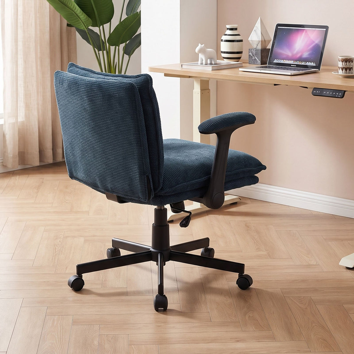 Garden Sanctuary chenille height-adjustable office chair with cushioned seat and backrest, featuring a sleek modern design.