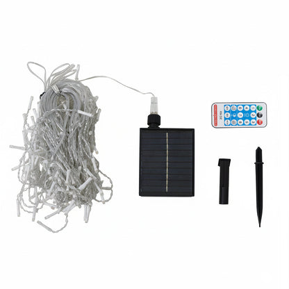 Garden Sanctuary solar-powered LED icicle string lights with remote control hanging outdoors during evening.