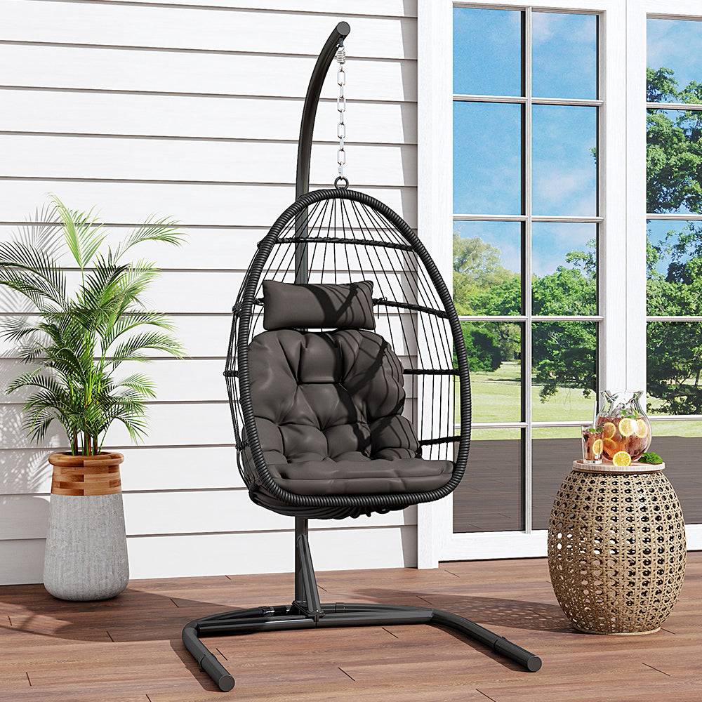 Garden Sanctuary outdoor hanging egg-shaped chair with sturdy frame and cushioned interior for relaxing outdoor seating.