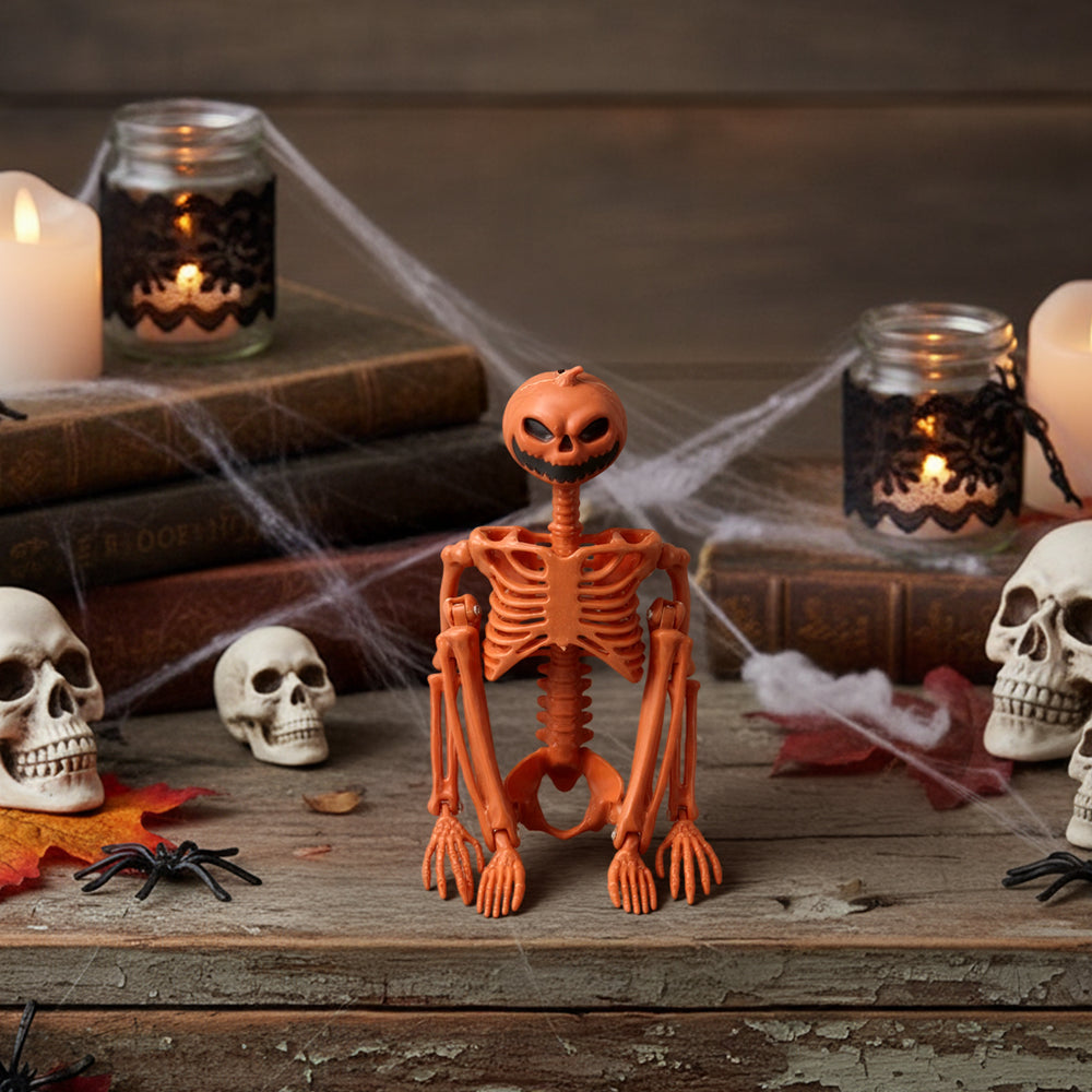 Posable Halloween pumpkin skeleton decoration by Garden Sanctuary, featuring a spooky skeleton with a carved pumpkin head for Halloween decor.