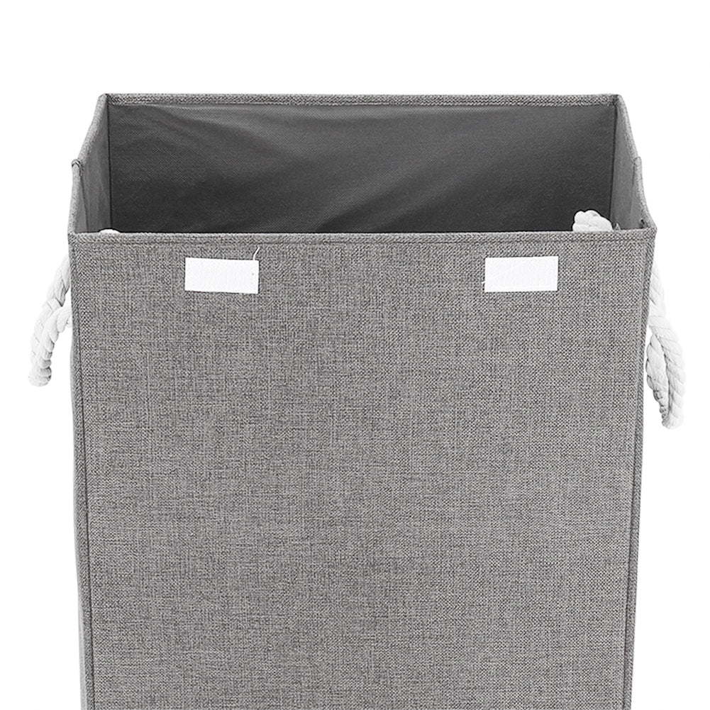 Foldable Garden Sanctuary laundry hamper with open-top design and sturdy handles, ideal for home laundry storage.