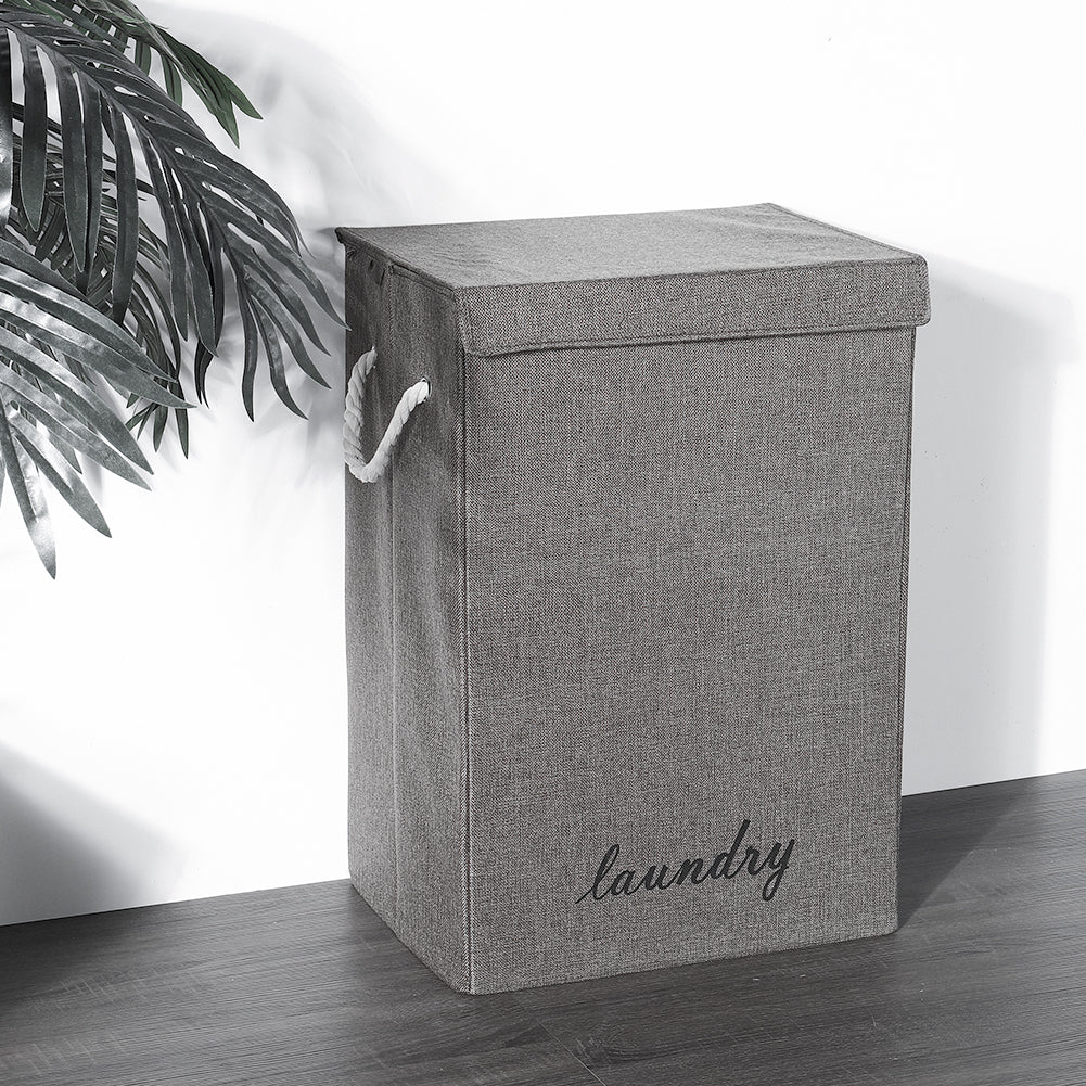 Foldable Garden Sanctuary laundry hamper with sturdy handles and breathable fabric, designed for home laundry storage.