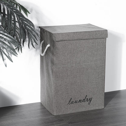 Foldable Garden Sanctuary laundry hamper with sturdy handles and breathable fabric, designed for home laundry storage.