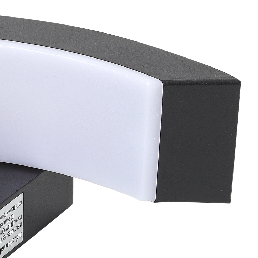 Modern black LED curved outdoor wall light by Garden Sanctuary, mounted on a wall, illuminating outdoor space with sleek design.