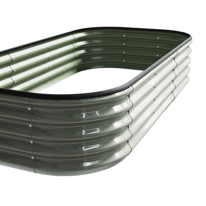Galvanized steel raised garden bed by Garden Sanctuary for outdoor gardening and storage, with a sturdy rectangular design.