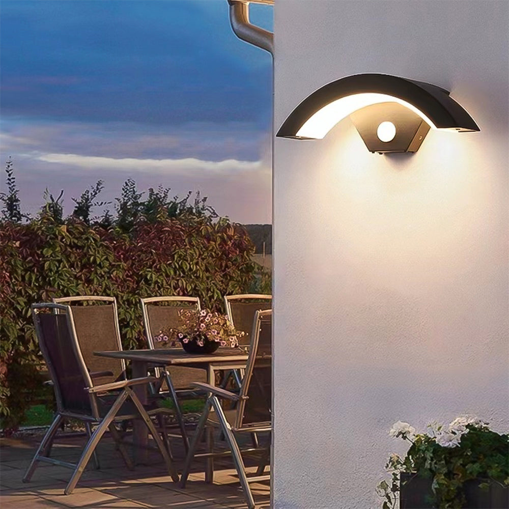 Modern black LED curved outdoor wall light by Garden Sanctuary, designed for stylish outdoor illumination.
