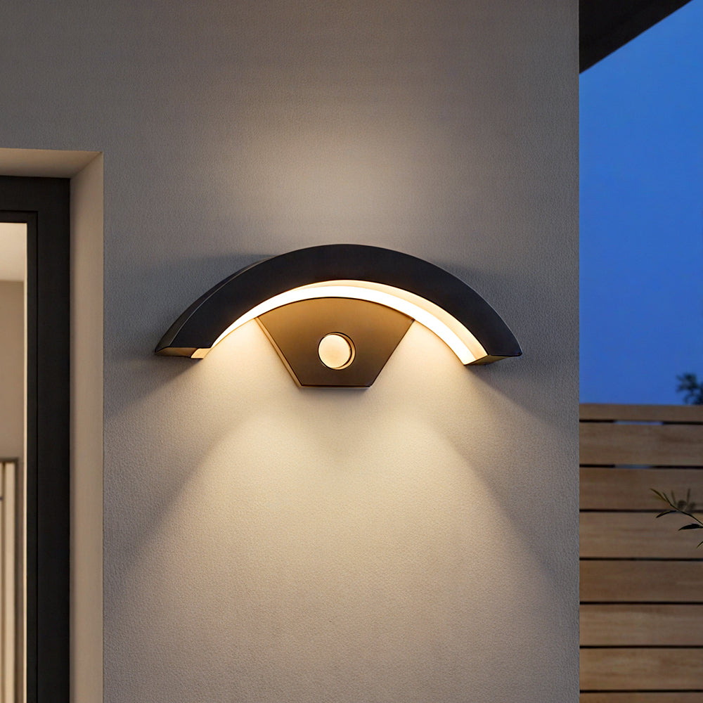 Modern black LED curved outdoor wall light from Garden Sanctuary, showcasing sleek design and energy-efficient induction lighting.